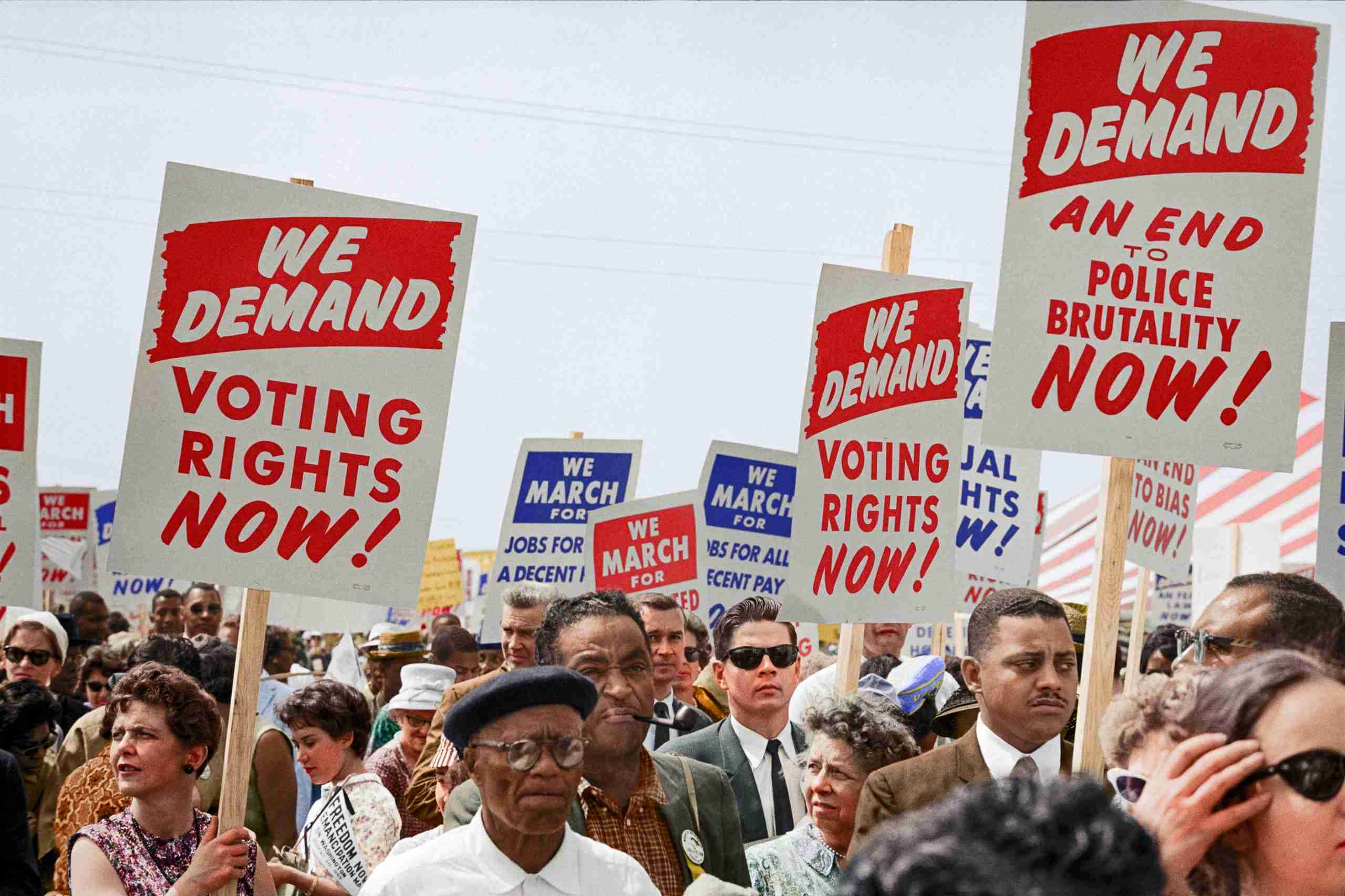 Marchers with signs at the March on Washington, 1963